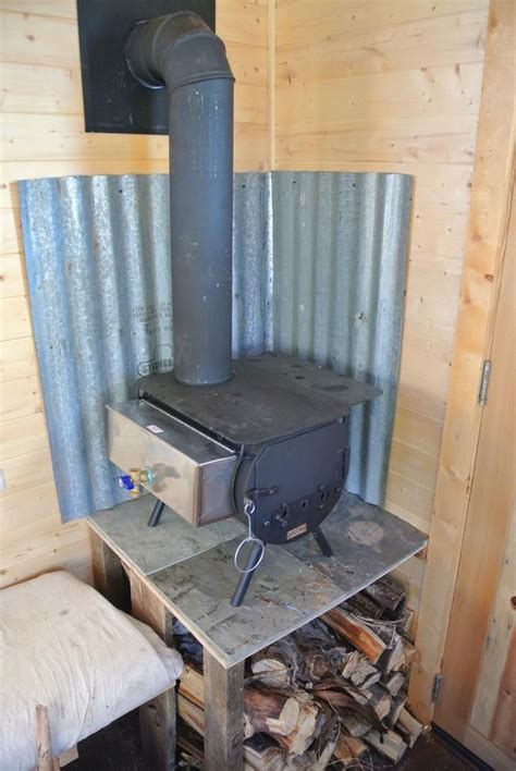 tiny house fireplace metal|small stove for tiny house.